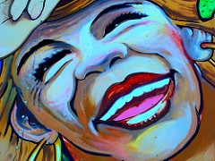 painting of laughing woman