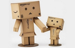 two robots made from cardboard boxes