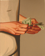 some dollar bills in someone's hands